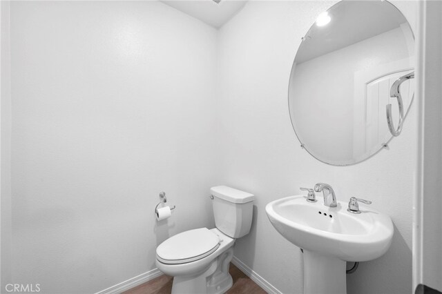 5418 Heitz Way, Fontana, CA 92336 - half bath with wood finished floors and toilet