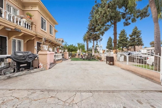 view of road featuring a residential view and driveway