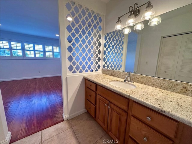 bathroom with vanity and tile patterned floors