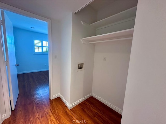 laundry room with dark hardwood / wood-style flooring and hookup for a washing machine