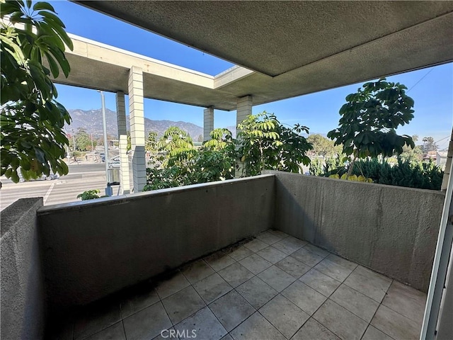 balcony featuring a mountain view