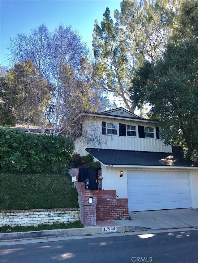 front of property with a garage