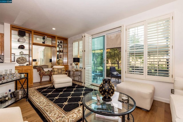 sitting room with light hardwood / wood-style floors