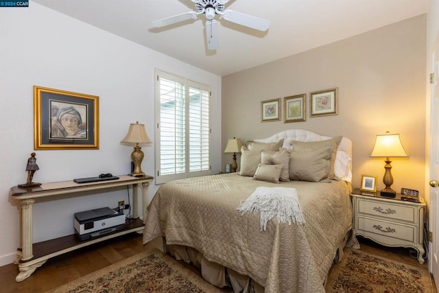 bedroom featuring ceiling fan and hardwood / wood-style floors