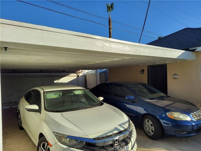 view of vehicle parking featuring a carport