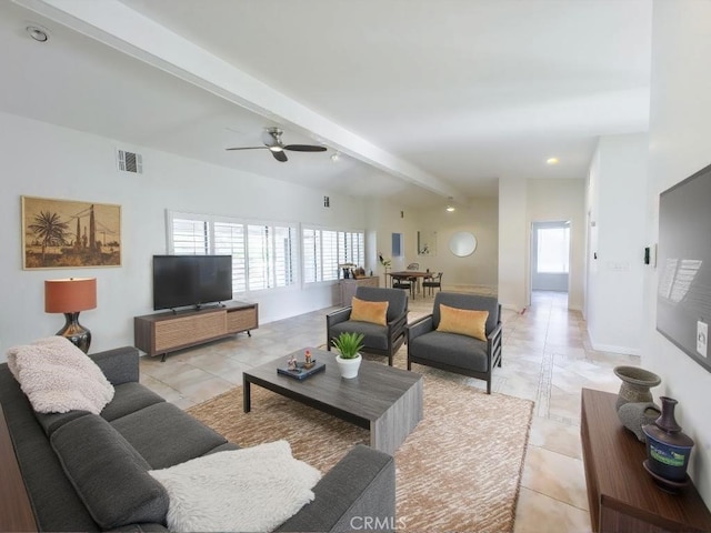 living room featuring ceiling fan, light tile patterned floors, and lofted ceiling with beams