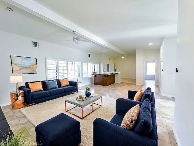 living room featuring ceiling fan and beam ceiling