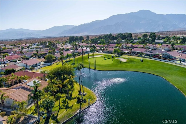 aerial view featuring a water and mountain view