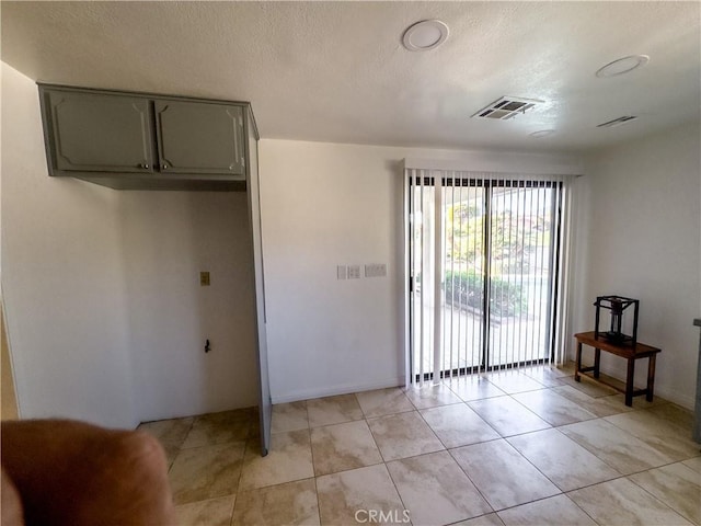 view of tiled spare room