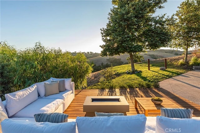 view of patio / terrace with an outdoor hangout area and a deck