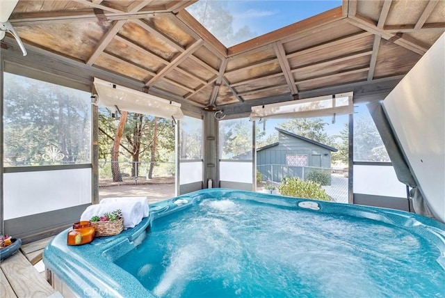 view of swimming pool with a gazebo and a hot tub