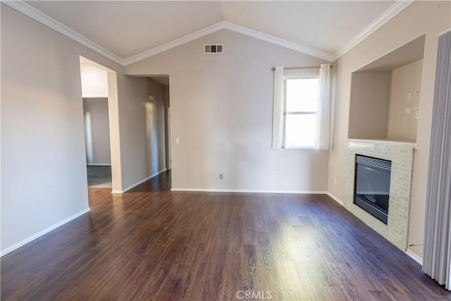 unfurnished living room featuring vaulted ceiling, dark wood-type flooring, and crown molding