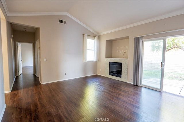 unfurnished living room with dark hardwood / wood-style floors, plenty of natural light, and lofted ceiling