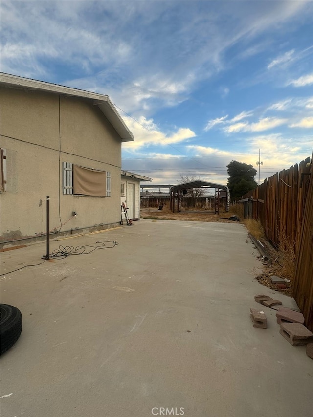24144 Joshua Ave, Boron, CA 93516 - view of home's exterior with stucco siding and fence