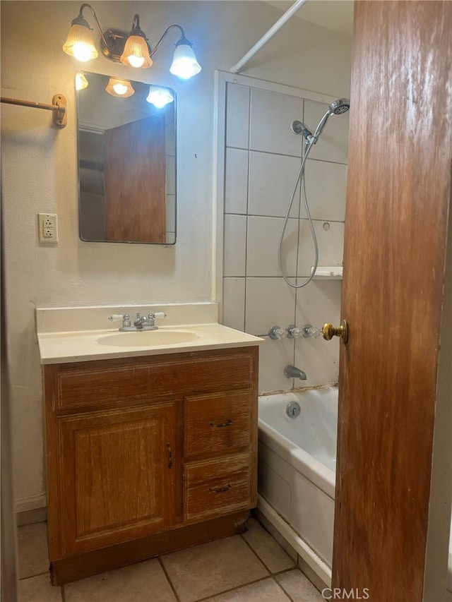 full bathroom with shower / bathtub combination, tile patterned floors, and vanity