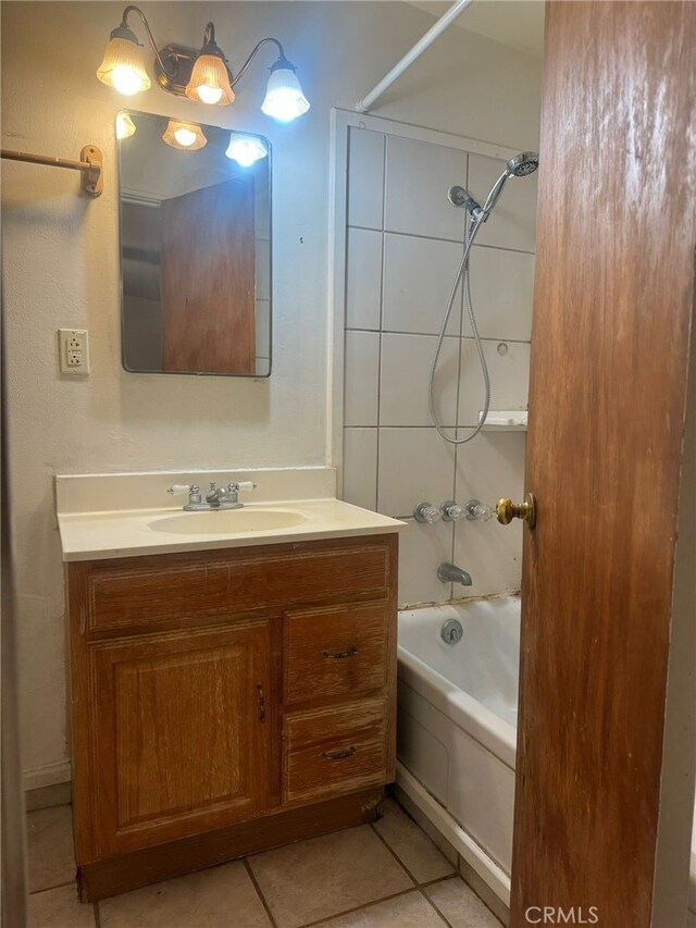 24144 Joshua Ave, Boron, CA 93516 - bathroom with tile patterned floors, vanity, and shower / washtub combination