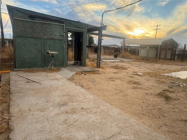 24144 Joshua Ave, Boron, CA 93516 - view of yard featuring an outbuilding and a shed