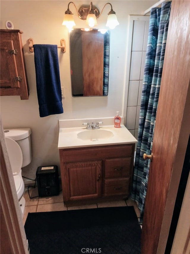 24144 Joshua Ave, Boron, CA 93516 - bathroom with tile patterned flooring, vanity, a shower with curtain, and toilet