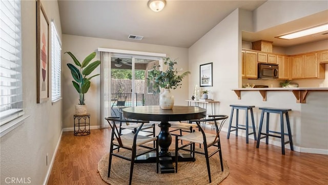 dining room featuring light hardwood / wood-style floors