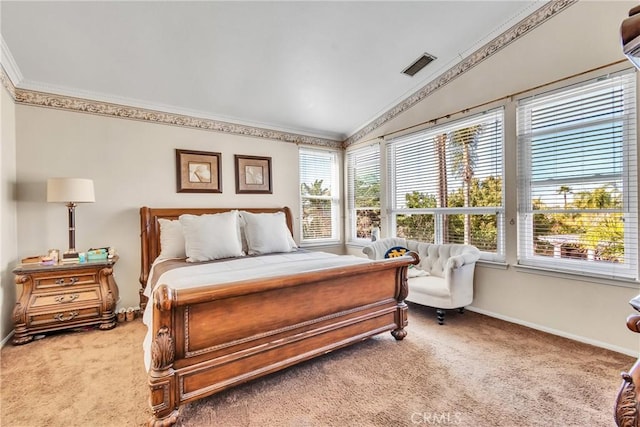 carpeted bedroom with multiple windows, vaulted ceiling, and ornamental molding