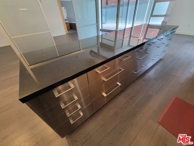 kitchen with dark hardwood / wood-style floors