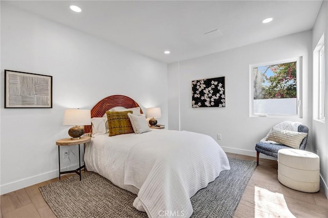 bedroom featuring light hardwood / wood-style floors