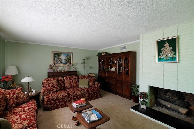 carpeted living room featuring a textured ceiling, ornamental molding, a fireplace, and visible vents