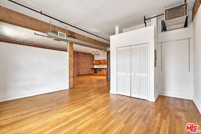 basement featuring light wood-type flooring