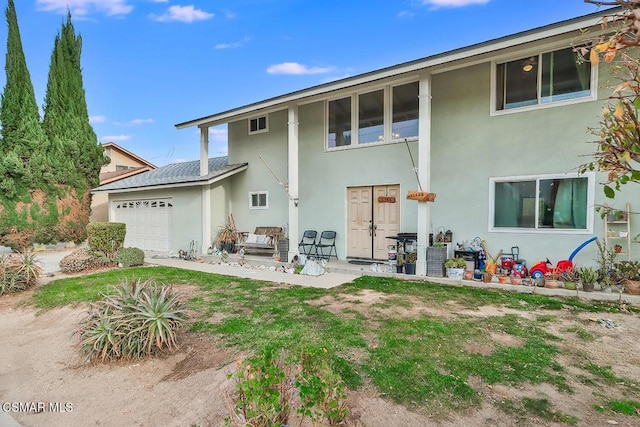 exterior space featuring a garage