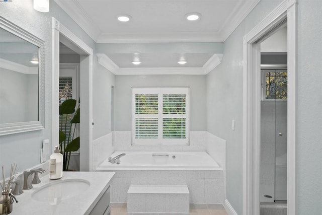 bathroom with vanity, tile patterned flooring, plus walk in shower, and ornamental molding