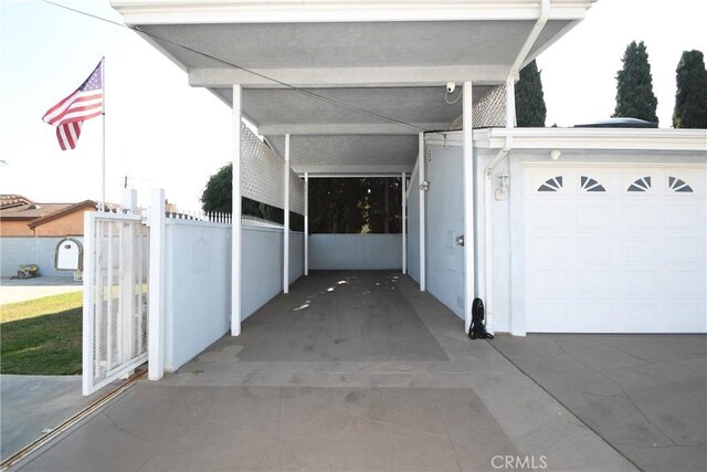 garage with a carport