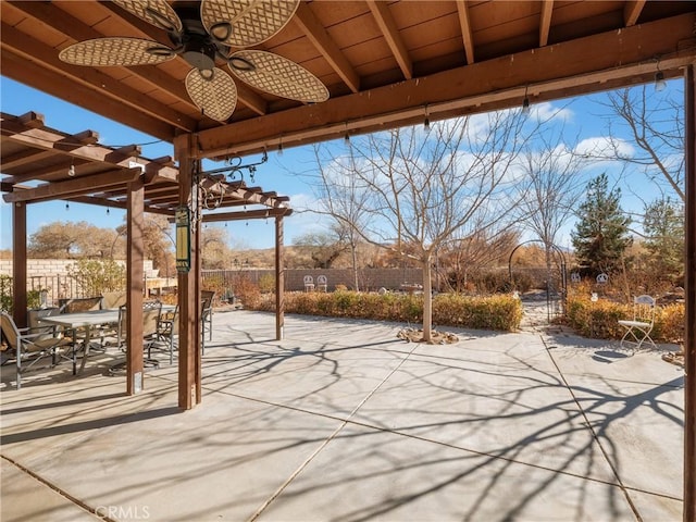 view of patio / terrace featuring ceiling fan and a pergola