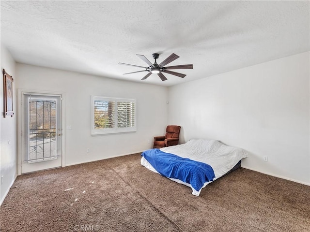 bedroom with carpet flooring, access to outside, and ceiling fan