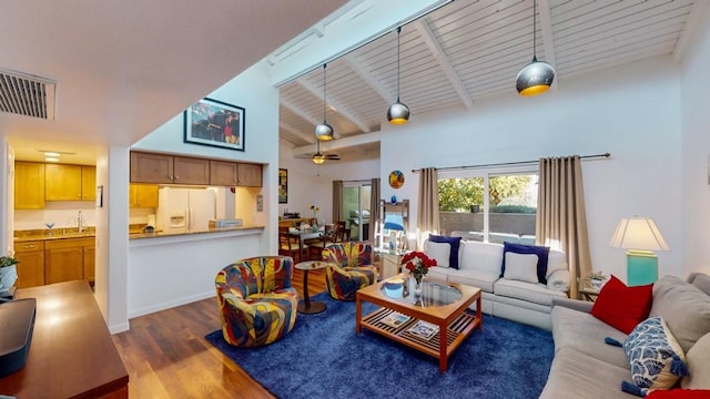 living room with hardwood / wood-style floors, wood ceiling, high vaulted ceiling, ceiling fan, and beam ceiling