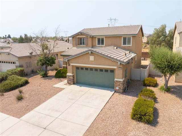 front of property with a garage