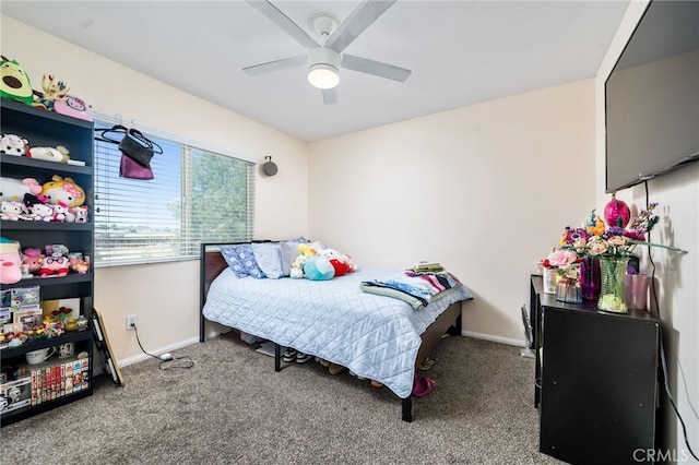 bedroom with ceiling fan and carpet floors