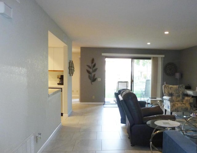 living room featuring light tile patterned floors