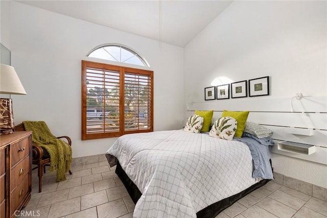 bedroom with light tile patterned flooring