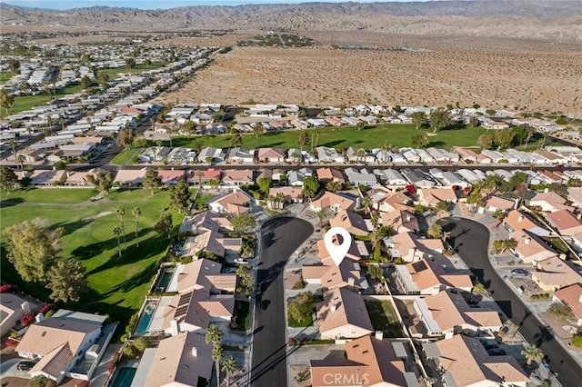 drone / aerial view featuring a mountain view