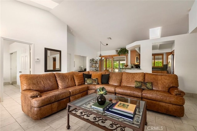 tiled living room with lofted ceiling