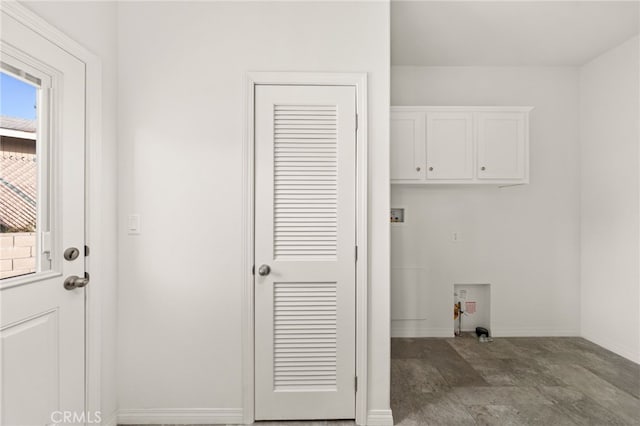 washroom featuring cabinets and washer hookup