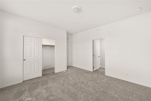 unfurnished bedroom with light carpet