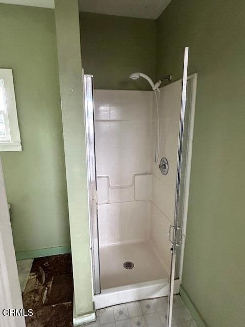 bathroom featuring walk in shower