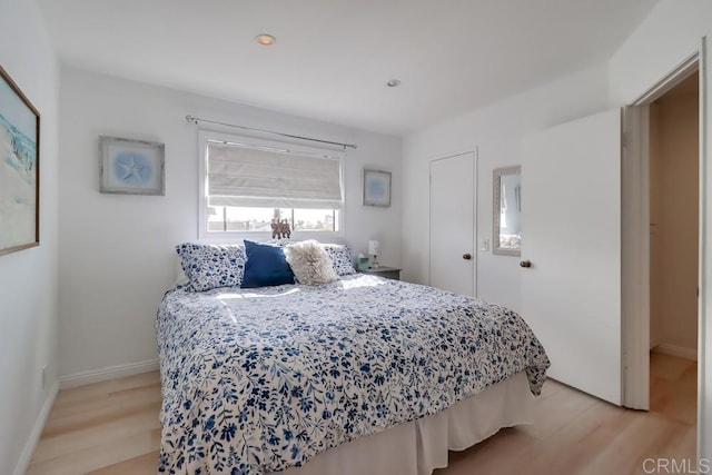 bedroom featuring light hardwood / wood-style flooring