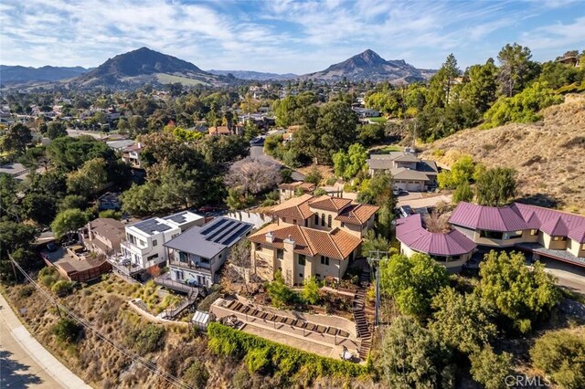 drone / aerial view featuring a mountain view