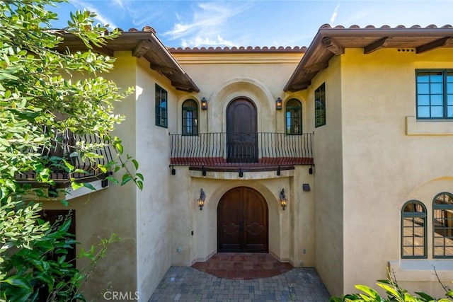 doorway to property with a balcony