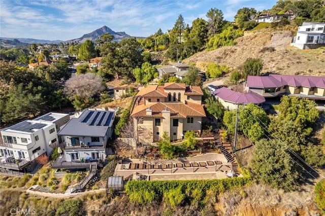 bird's eye view with a mountain view