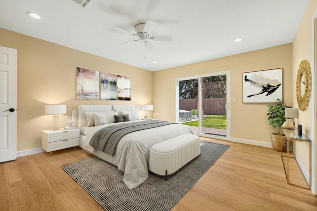 bedroom with light wood-type flooring, ceiling fan, and access to exterior