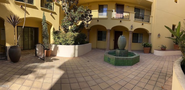 view of patio with a balcony