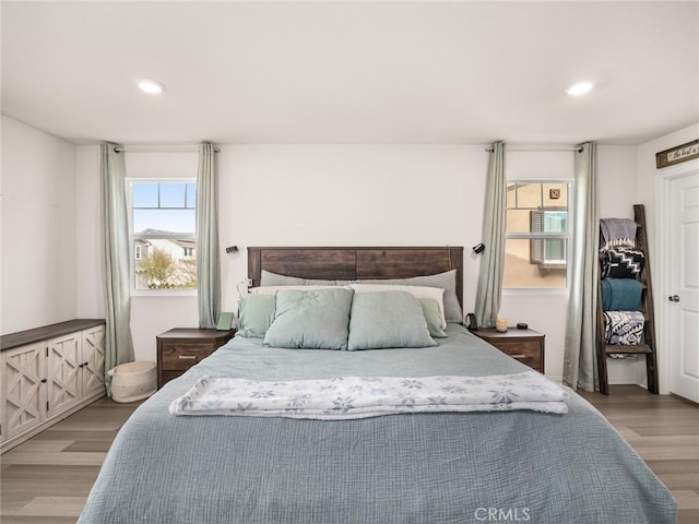 bedroom featuring light hardwood / wood-style floors